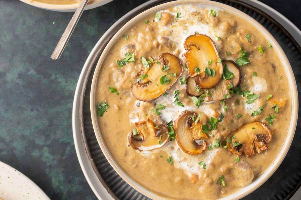 A close up shot of mushroom lentil soup.