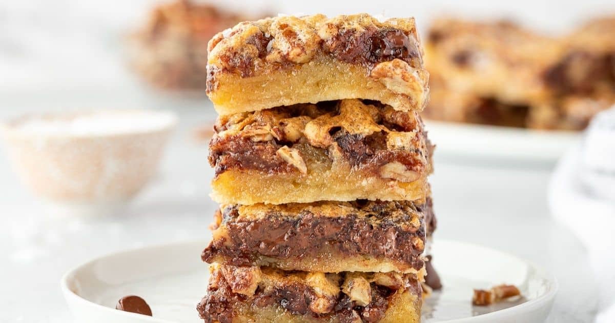 A close up shot of chocolate pecan pie bars.