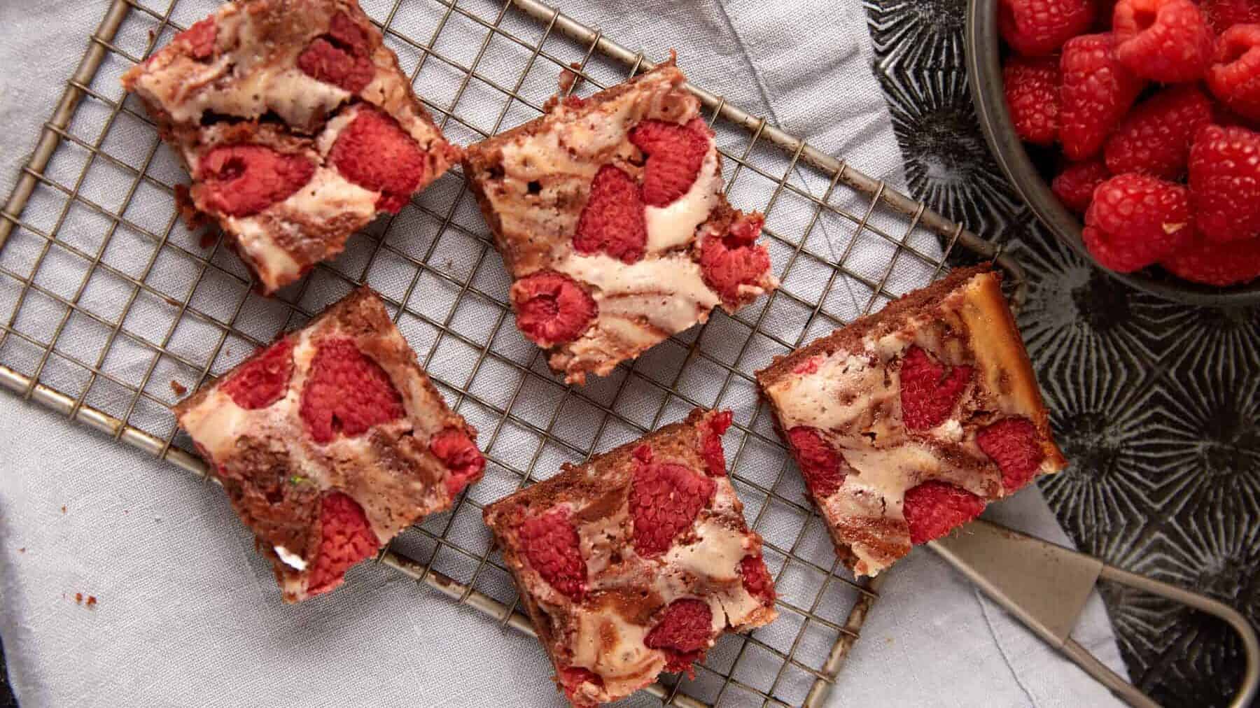 A close up shot of raspberry cream cheese brownies.