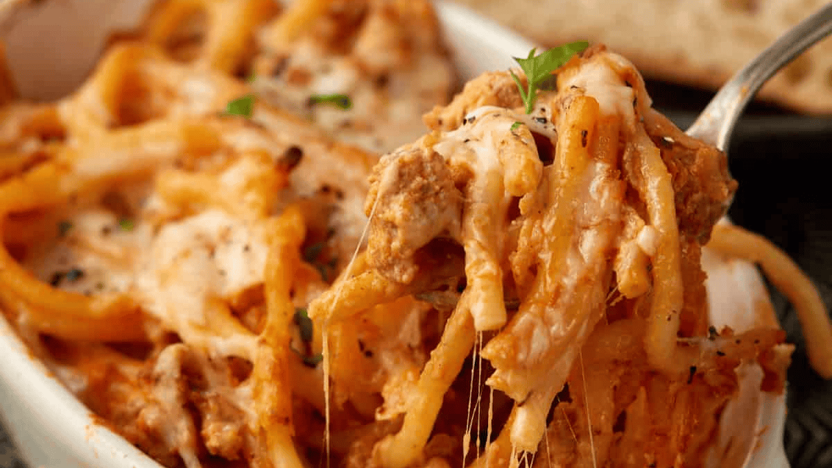 A close up shot of baked spaghetti.